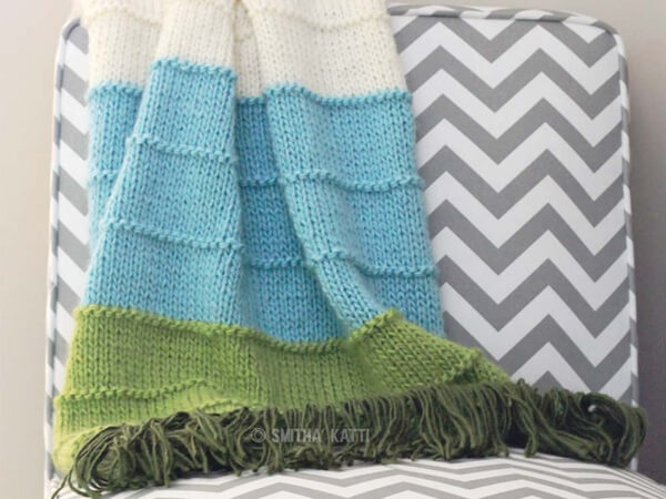 KNIT MULTI COLORED BLANKET